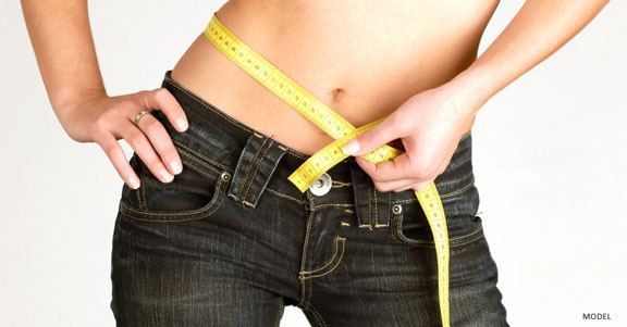 Tummy Tuck or Liposuction: How Do You Decide?