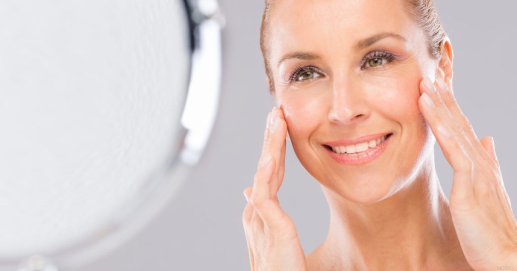 Woman after facial fat transfer. (Model)